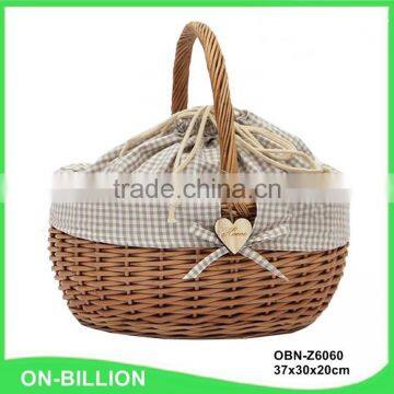 Large oval natural wicker tote basket for food storage