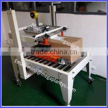 Semi-automatic plastic carton box sealing machine with tape