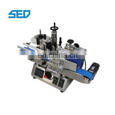 Tabletop Automatic PET Plastic Bottle Automatic Labeling Machine for 20-80mm Bottle Diameter