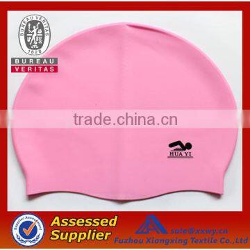 pink rubber swim cap