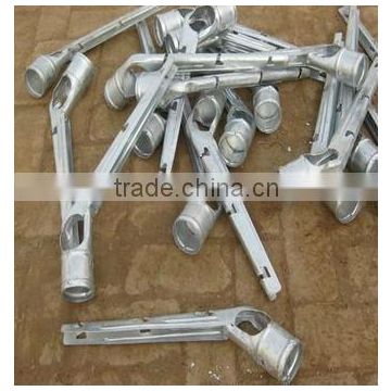 Chain link fence with barbed arms and fittings