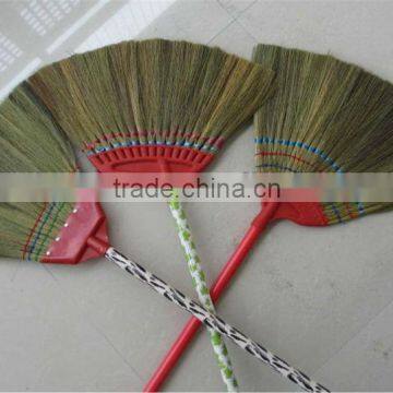 broom with wooden handle used for garden broom