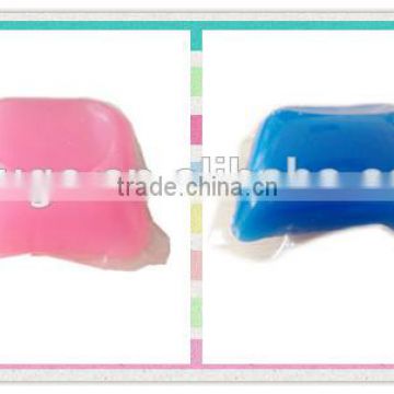 colorful laundry capsules liquid pods household chemical