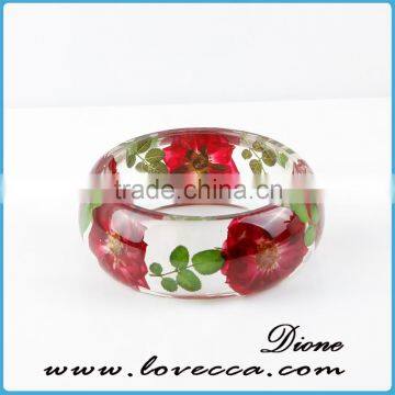 ladies fancy wide presin bangle, red flowers clear resin bangle