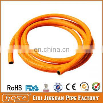 Orange Flexible Fibre braided High Pressure PVC Fuel Gas Hose Pipe used in Stove with yellow stripes and spot for Russian Market