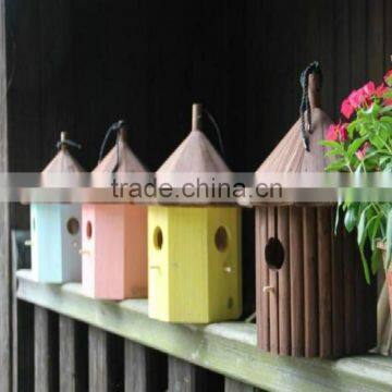 Painting color round small wooden bird houses, outdoor decoration bird house