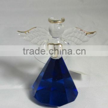 glass angel figurine with blue design