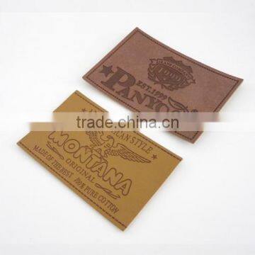 Custom embossed brown leather patch for jeans and shoes