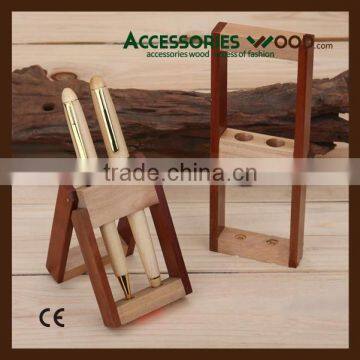 Two different Wooden WOOD Pens in wood folding stand