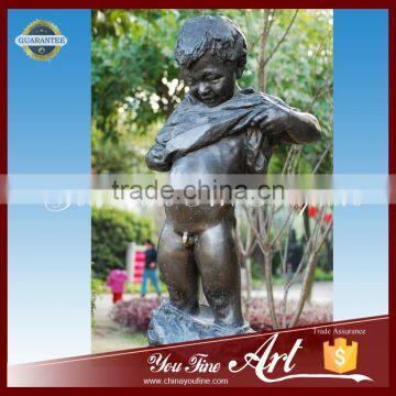 bronze boy pee sculpture for garden