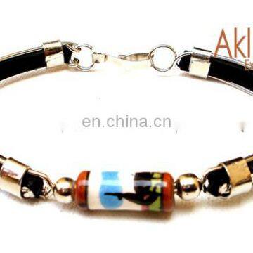 Handmade Rubber Bracelet Decorated with Metal and Ceramic