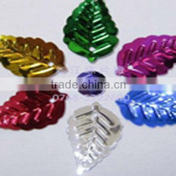 Leaf-shape metallic confetti for party or holiday decorations