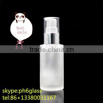 hot sale small glass bottle with press pump plastic top cover