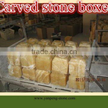 carved stone boxes