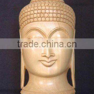 Wood carving of lord Buddha's sculpture