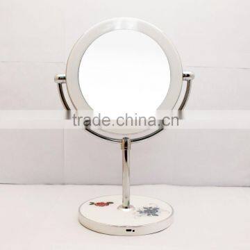 Single side free rotating stand mirror with bluetooth speaker