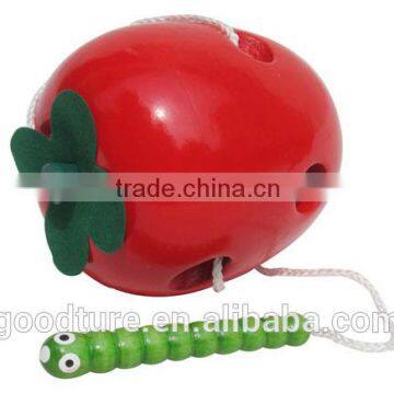Wooden Caterpillar Eating Red Apple photo-3