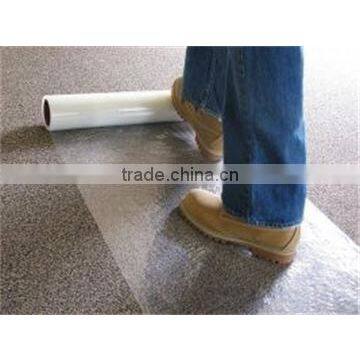 Transparent adhesive protection film for carpet