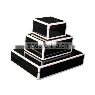 Glossy black lacquer box with white trim