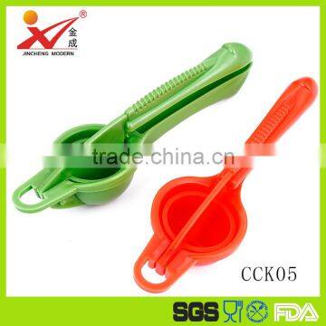 plastic material kitchen vegetable fruit orange lemon squeezer