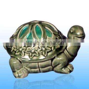 Ceramic tortoise shape battery operated luminary with inner color changing led candle for night decoration