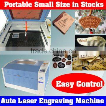 Automatic Portable Hot Sale Laser Engraving Machine in Zhengzhou Carving Wood,Stone,Glass,PVC,Crystal,Leather,Plastic for Sale