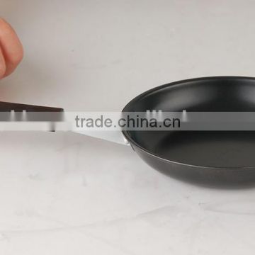 Non-stick carbon steel frying pan with bakelite handle