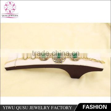 2015 Yiwu new products antique gold plated bracelet with rhinestone and emerald imitation jade