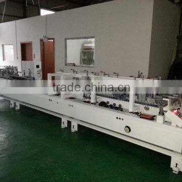 Automatic plastic box folding and gluing machine