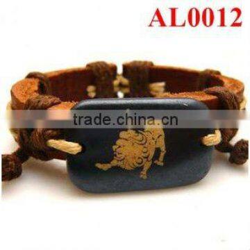 Unique bracelet, leather bracelet with cord connecting an ox bone carved lion AL0012