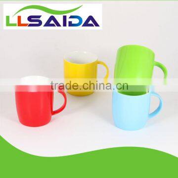 2014 hot selling ceramic glazed mugs in various colors