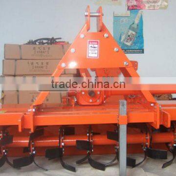 Side gear driven rotary tiller
