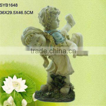 Hand carved outdoor children garden statue for sale.