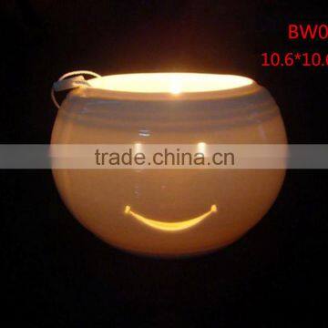 white ceramic tea light holder