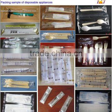 Diposable Spoons Wrapping Machine, Packaging Machinery for Plastic Spoons, Tissue and Spoon Packing Machine photo-5