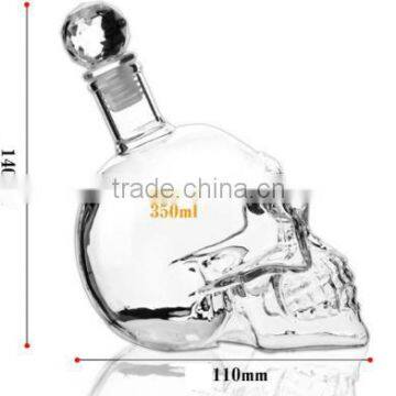 Haonai wholesale 750ml 1000ml glass vodka whisky wine skull bottles with stopper