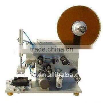 Semi automatic small round crayon labelling machine