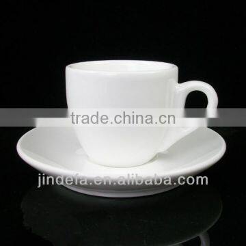 white porcelain cappuccino coffee cup and saucer