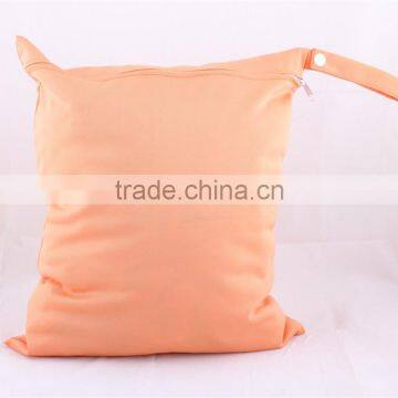 Wholesale Zipper Diaper Bag and Waterproof Wet Bag for Baby Diaper photo-4