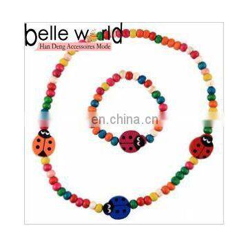 Girls Elasticated Ladybiry Wooden Bead Necklace and Bracelet Set