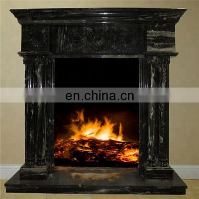 carved black granite fireplace surround,stone fireplace