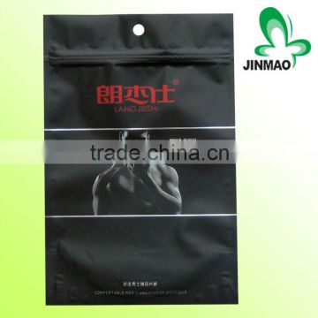 Clothing packaging bag with one side clear and foil inside