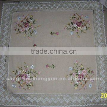 Embroidered floral stain resistant tablecloths