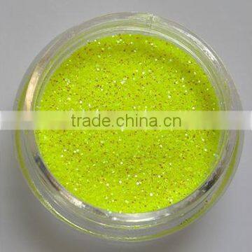 cosmetic glitter powder in apple green