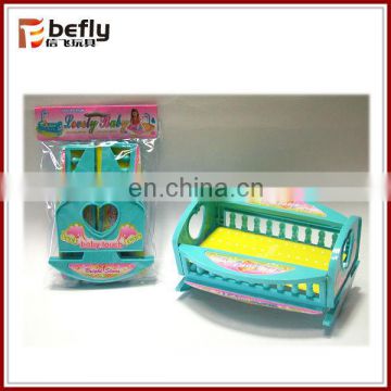 Small plastic doll bed toy