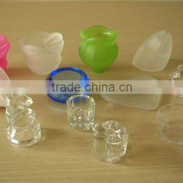 different shape varicolored glass candleholder