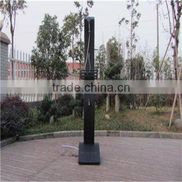 Twisted shaped rattan shower with a pulley system