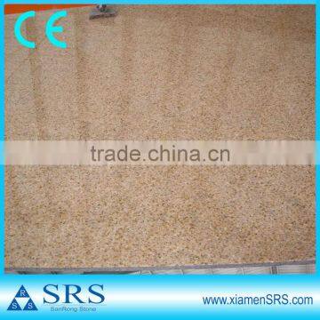 Polished granite Desert Gold slab