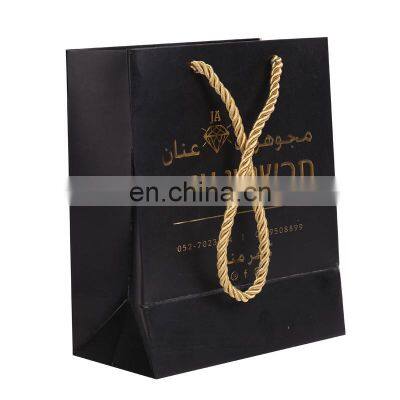 Black Embossed Gold Logo Paper Shopping Bag With Handle photo-3