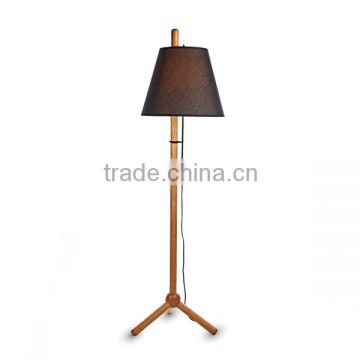 wooden tripod floor lighting with beige luxury shade